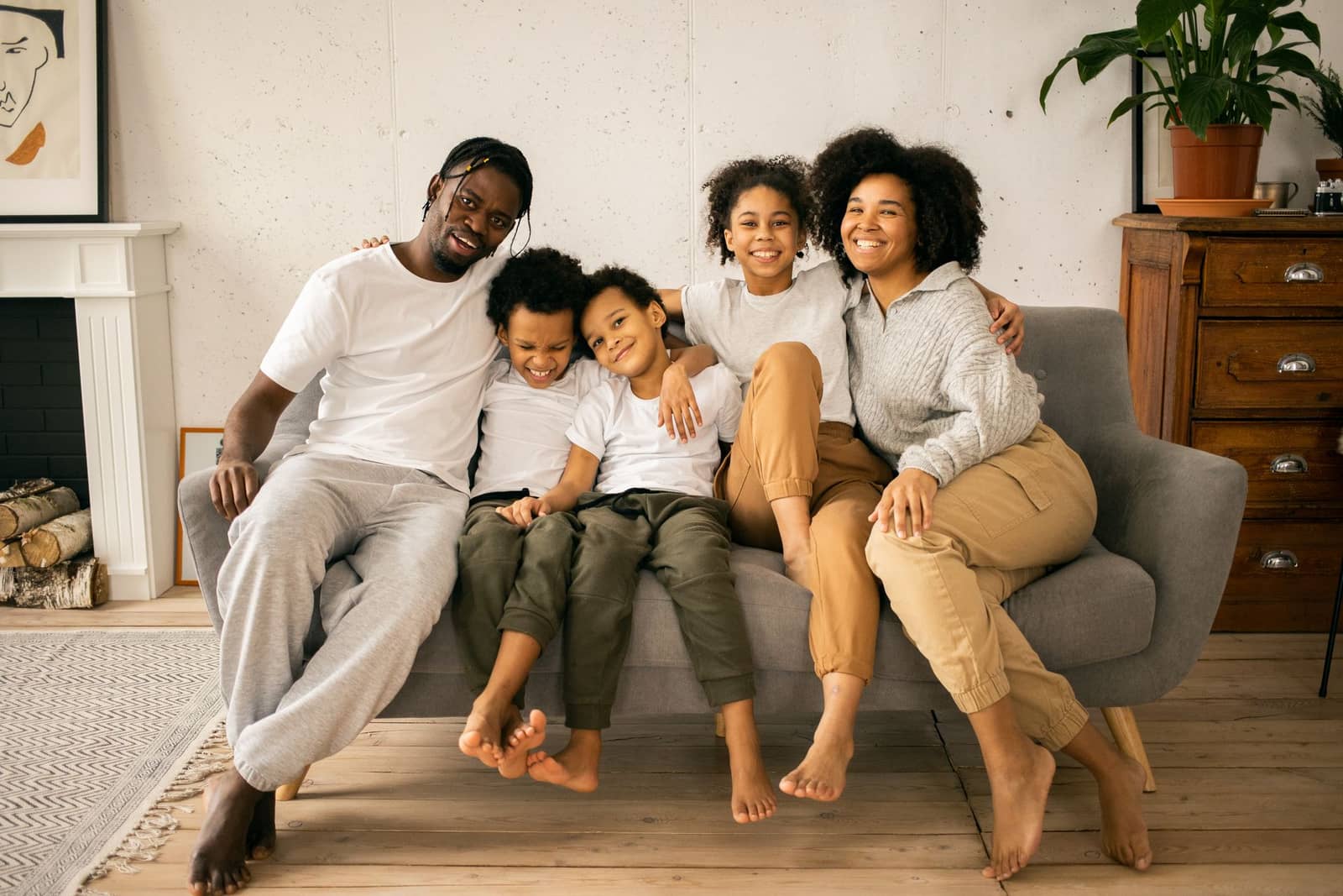 A smiling family relaxing together at home