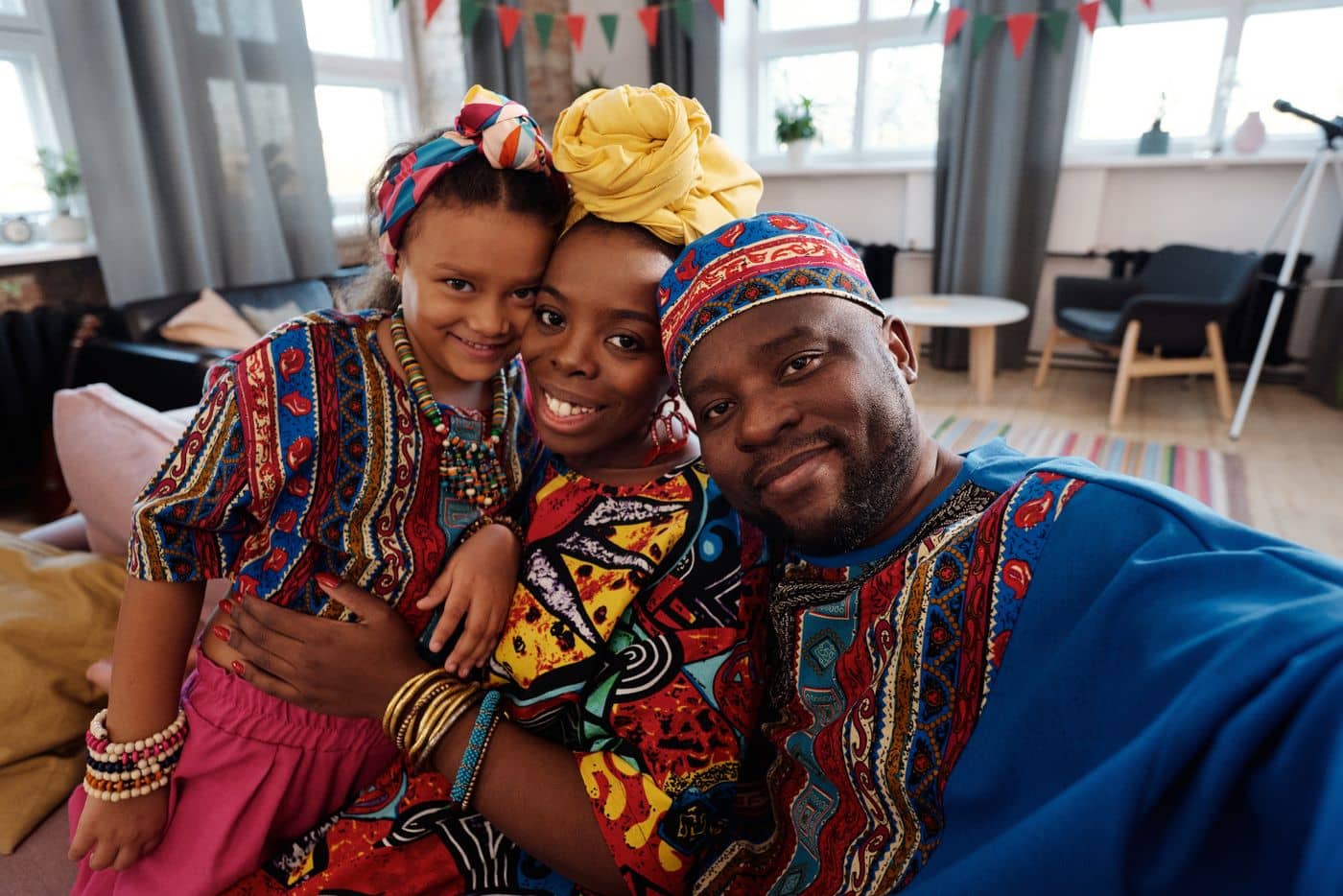 Smiling family in colourful traditional clothing