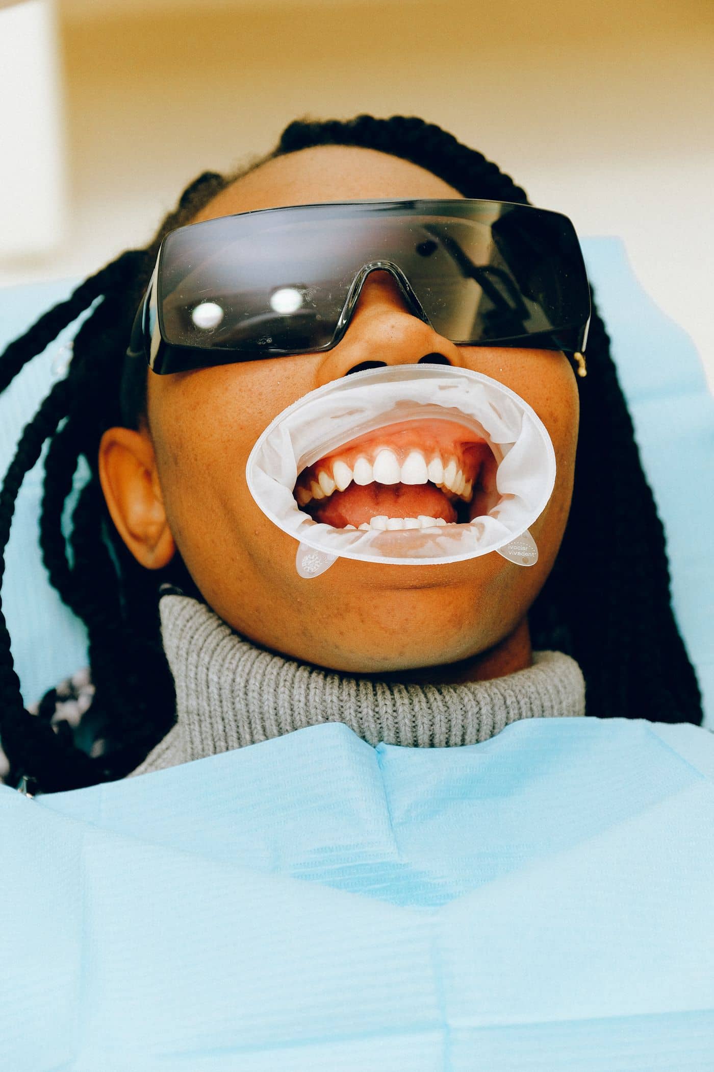 Smiling patient showing clean, healthy teeth during a check-up